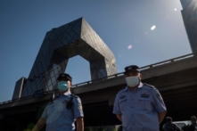 Nhóm các ký giả kêu gọi Trung Quốc thả tự do cho 11 người cung cấp hình ảnh về đại dịch cho The Epoch Times