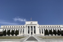 Fed giữ lãi suất ổn định, có thể giảm mua trái phiếu ‘sớm’