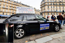 Hai người đàn ông làm hư xe, quấy rối học viên Pháp Luân Công và gia đình ở trung tâm thành phố Paris