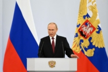 Tổng thống Nga Vladimir Putin có bài diễn văn trong buổi lễ chính thức sáp nhập bốn khu vực của Ukraine mà quân đội Nga đang chiếm đóng, tại Điện Kremlin ở Moscow, hôm 30/09/2022. (Ảnh: Grigory Sysoyev/Sputnik/AFP qua Getty Images)