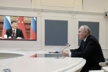 Tổng thống Nga Vladimir Putin tổ chức một cuộc họp với lãnh đạo Trung Quốc Tập Cận Bình qua liên kết video tại Điện Kremlin ở Moscow hôm 30/12/2022. (Ảnh: Mikhail Klimentyev/Sputnik/AFP qua Getty Images)