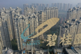 Logo của nhà phát triển Country Garden Holdings của Trung Quốc trên đỉnh một tòa nhà ở Trấn Giang, phía đông tỉnh Giang Tô của Trung Quốc, vào ngày 31/10/2021. (Ảnh: STR/AFP/Getty Images)