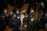 Phái đoàn quân đội Trung Quốc rời phiên bế mạc Đại hội Đảng Toàn quốc lần thứ 20 của Đảng Cộng sản Trung Quốc tại Đại lễ đường Nhân dân ở Bắc Kinh, vào ngày 22/10/2022. (Ảnh: Kevin Frayer/Getty Images)
