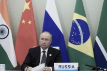 Tổng thống Nga Vladimir Putin tham gia hội nghị thượng đỉnh BRICS lần thứ XIV theo hình thức trực tuyến thông qua một cuộc gọi video, tại Moscow, vào ngày 23/06/2022. (Ảnh: Mikhail Metzel/Sputnik/AFP qua Getty Images)