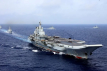 Hàng không mẫu hạm Liêu Ninh của Trung Quốc tham gia một cuộc tập trận quân sự của Hải quân Quân Giải phóng Nhân dân Trung Quốc (PLA) ở tây Thái Bình Dương vào ngày 18/04/2018. (Ảnh: Reuters)