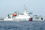 Một tàu hải cảnh Trung Quốc đang tuần tra Bãi cạn Scarborough (đảo Hoàng Nham) ở Biển Đông vào ngày 25/12/2022. (Ảnh: STR/AFP qua Getty Images)