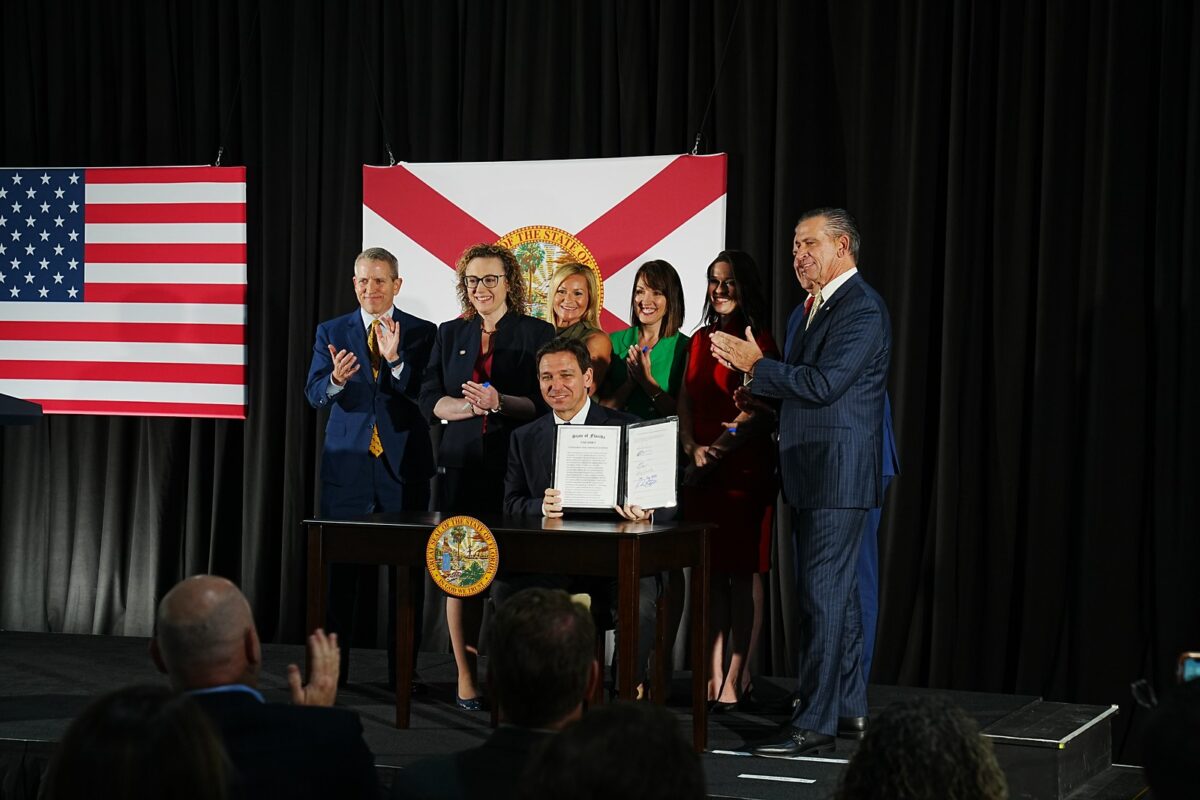Florida Gov. Ron DeSantis signs legislation banning the financial industry’s use of ESG principles on May 2. (Courtesy of the Florida Governor’s Office)