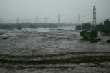 Hôm 01/08, sông Vĩnh Định ở Bắc Kinh tràn nước dẫn đến lũ lụt. (Ảnh: Pedro Pardo/AFP)