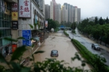 Hôm 08/09, mưa lớn ở Hồng Kông gây ra thảm họa khiến nhiều nơi ngập lụt nặng nề. (Ảnh: Bertha Wang/AFP qua Getty Images)