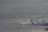 Những gì được cho là xe tăng và quân nhân của Azerbaijan trong một cuộc tấn công ở khu vực ly khai Nagorno-Karabakh, trong một hình ảnh tĩnh từ đoạn phim do Bộ Quốc phòng Armenia công bố vào ngày 27/09/2020. (Ảnh: Bộ Quốc phòng Armenia/Tư liệu báo chí qua Reuters)