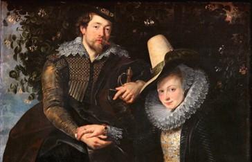 Tác phẩm “Rubens and Isabella Brandt, the Honeysuckle Bower” (Rubens và Isabella Brandt, cùng cây kim ngân hoa) (tranh đã cắt cúp) vào khoảng năm 1609–1610, của họa sĩ Peter Paul Rubens. Sơn dầu trên vải canvas; kích thước: 5 3/4 feet x 4 1/2 feet (~154cm x 123cm). Bảo tàng Nghệ thuật Alte Pinakothek, Munich. (Ảnh: Tài liệu công cộng)
