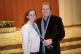 Bà Ashlee McDonald và ông Gene Curtin thưởng thức Nghệ thuật Biểu diễn Shen Yun tại Nhà hát Giao hưởng Atlanta, thành phố Atlanta, tiểu bang Georgia, hôm 05/01/2024. (Ảnh: Frank Liang/The Epoch Times)
