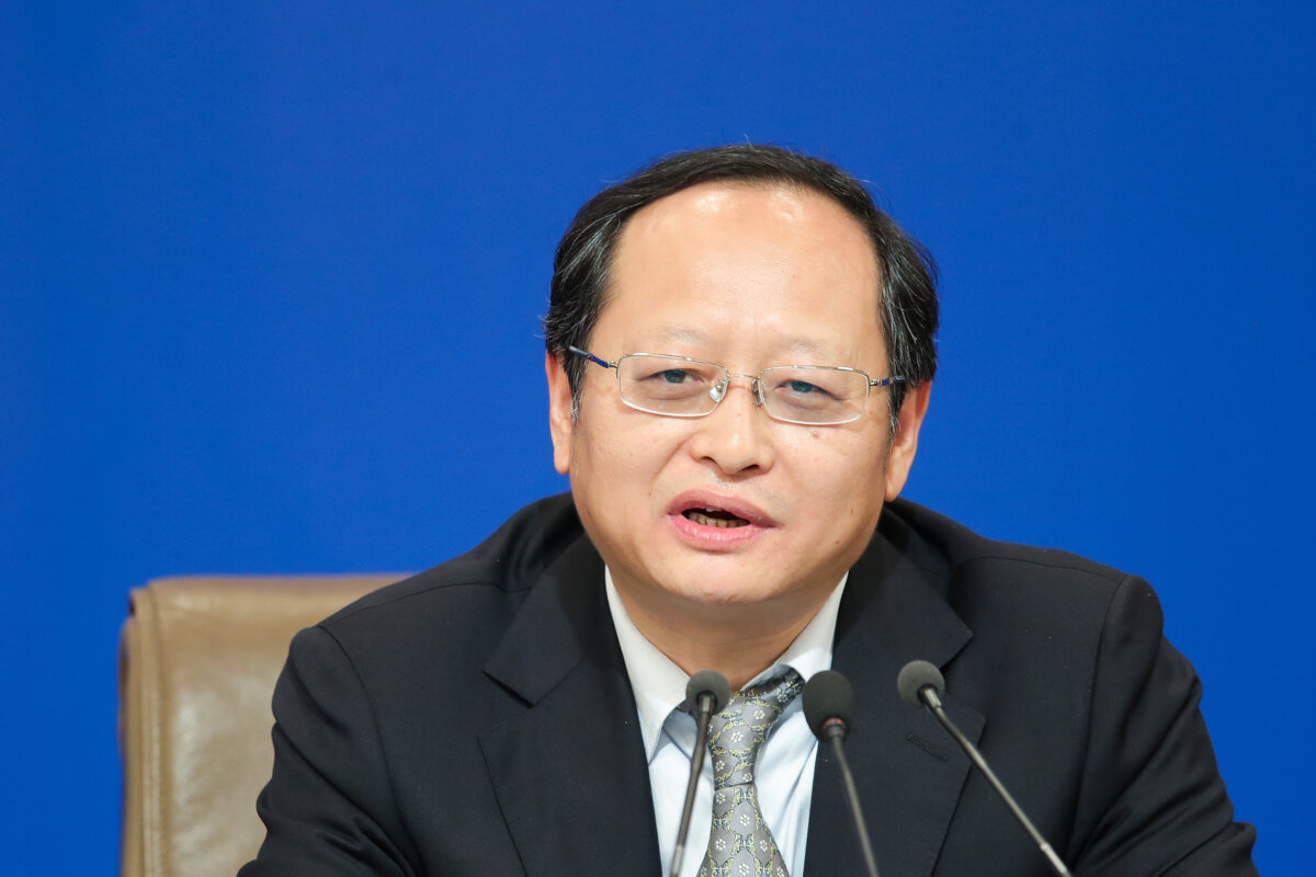 Ông Trình Lập Phong tham dự cuộc họp báo về công tác lập pháp của Đại hội Đại biểu Nhân dân Toàn quốc (NPC) tại kỳ họp thứ hai của Đại hội 13 tại Trung tâm truyền thông ở Bắc Kinh vào ngày 09/03/2019. (Ảnh: Lintao Zhang/Getty Images)