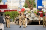 Những binh sĩ quân đội Sudan trung thành với Tổng Tư lệnh quân đội Abdel Fattah al-Burhan đang cai quản một khu vực tại thành phố Port Sudan bên bờ Hồng Hải, vào ngày 20/04/2023. (Ảnh: AFP qua Getty Images)